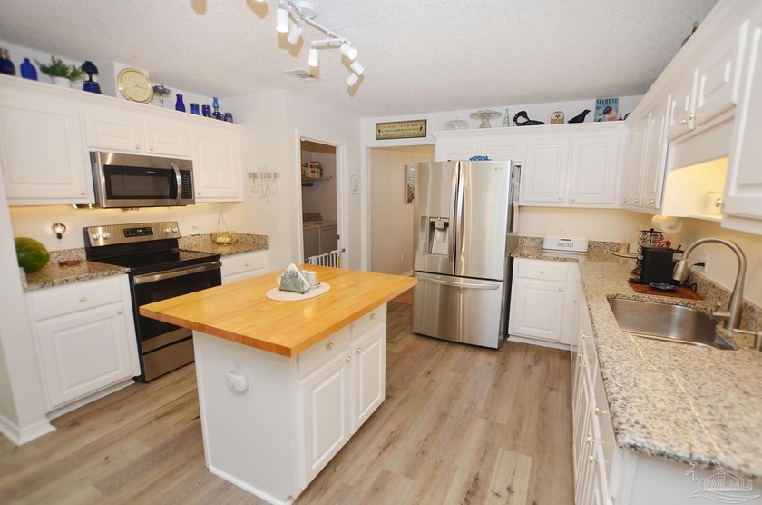 Welcome to your dream home nestled in the highly sought-after - photo 2