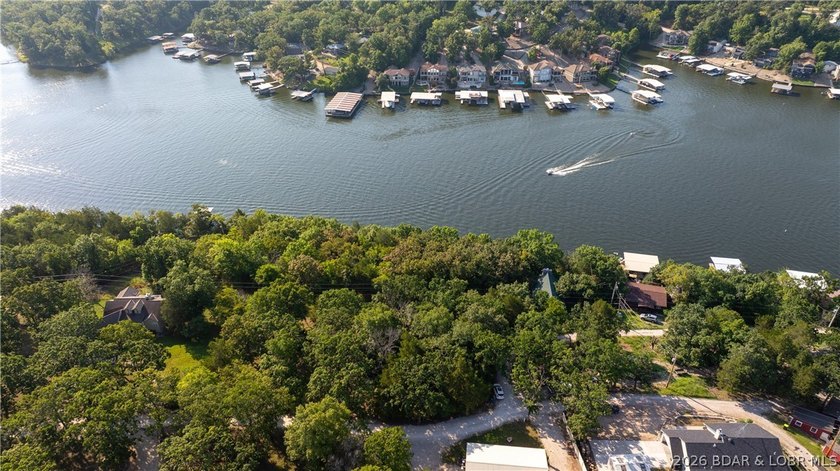 One of a kind property! Boasting 115 feet of Lakefront on the - photo 3