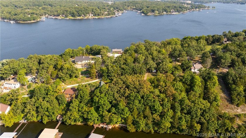 One of a kind property! Boasting 115 feet of Lakefront on the - photo 5