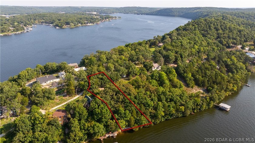 One of a kind property! Boasting 115 feet of Lakefront on the - photo 6