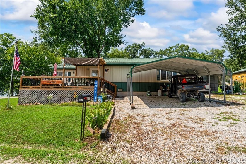 TWO HOMES &amp; A LAKEFRONT LOT - Unique Investment Opportunity at - photo 2
