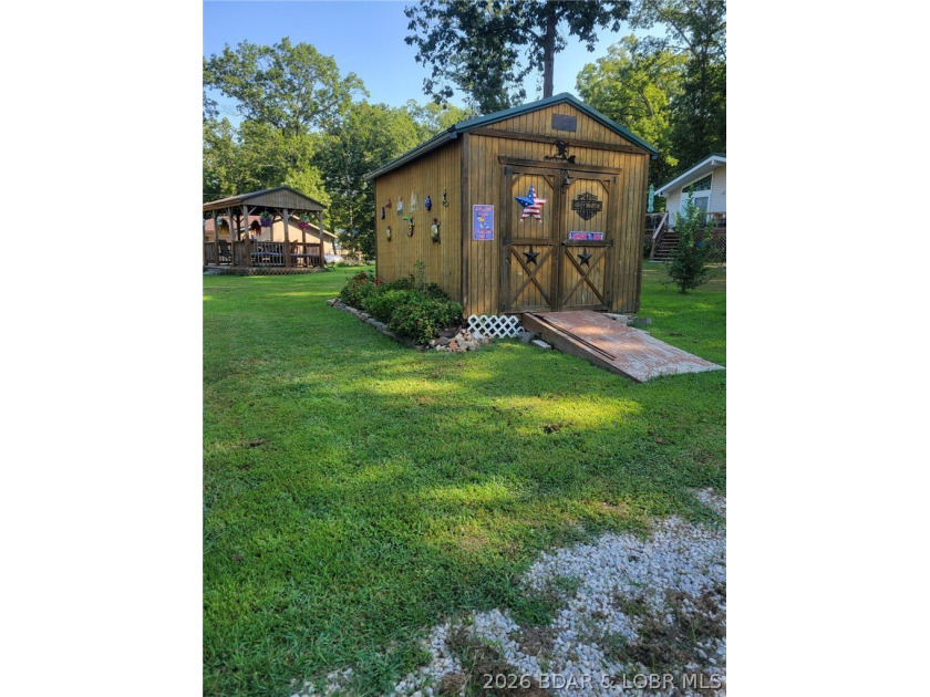 TWO HOMES &amp; A LAKEFRONT LOT - Unique Investment Opportunity at - photo 9