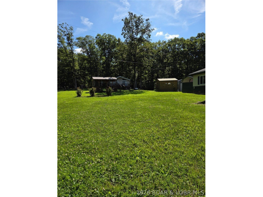 TWO HOMES &amp; A LAKEFRONT LOT - Unique Investment Opportunity at - photo 10