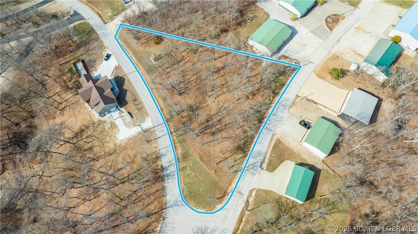 1.36 acres m/l of level land encompassing a corner lot that is - photo 5