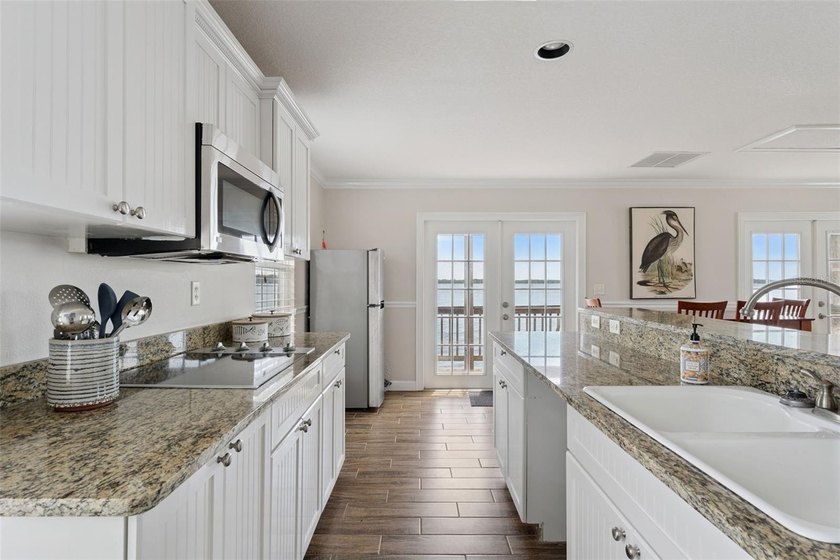 ***King of the Hill*** 1849 Moorings Court presents a rare - photo 26
