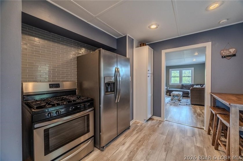 Adorable and fully renovated lake home on the 77-mile marker of - photo 9