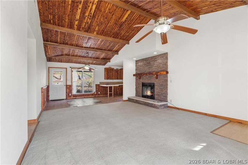 BRAND NEW ROOF!! Situated on 3/4 of an acre in a private setting - photo 4