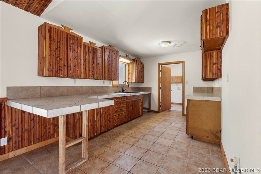 BRAND NEW ROOF!! Situated on 3/4 of an acre in a private setting - photo 8