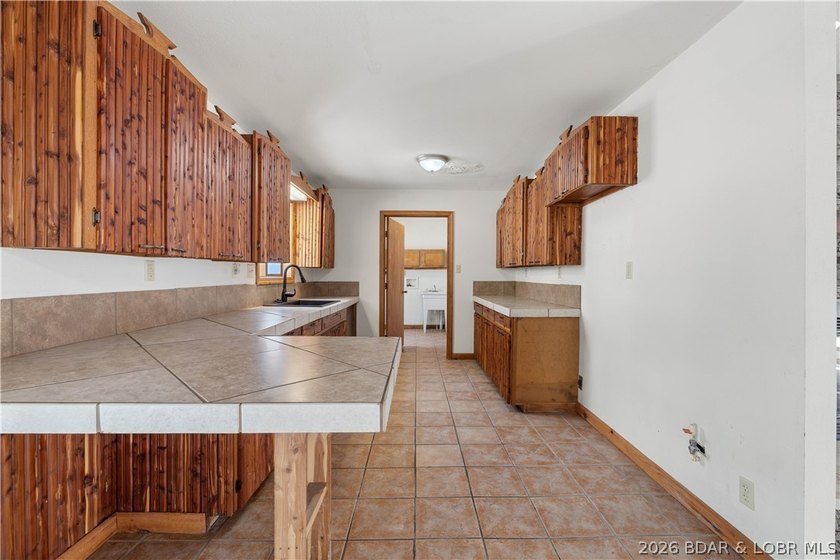 BRAND NEW ROOF!! Situated on 3/4 of an acre in a private setting - photo 9