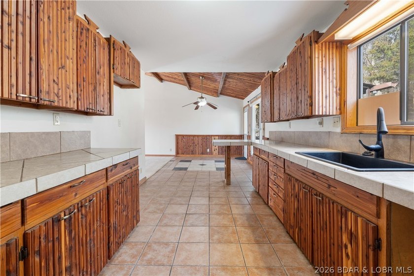 BRAND NEW ROOF!! Situated on 3/4 of an acre in a private setting - photo 10