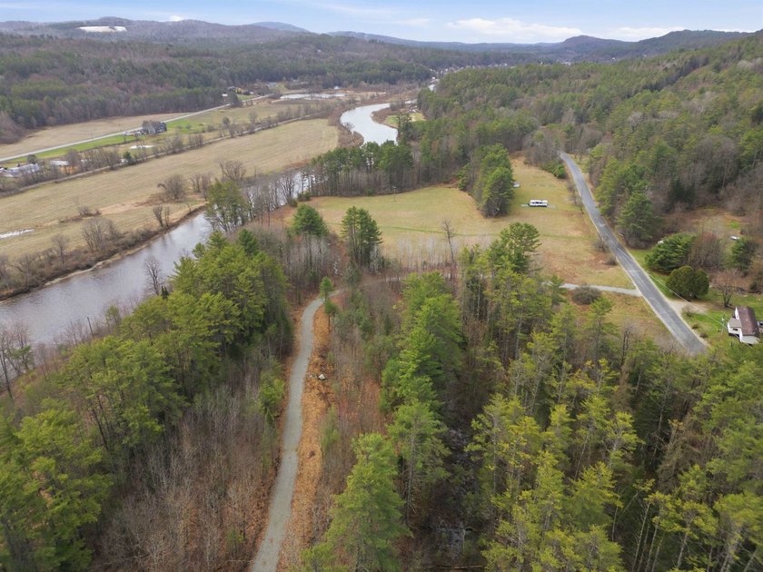 2.55 serene acres with 160 feet of Ammonoosuc River frontage, an - photo 4