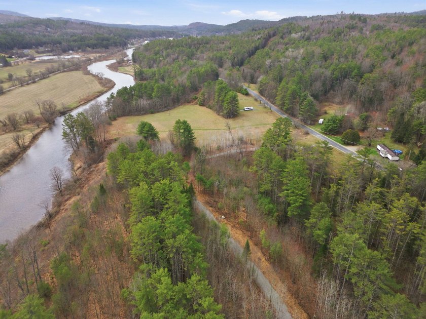 2.55 serene acres with 160 feet of Ammonoosuc River frontage, an - photo 5