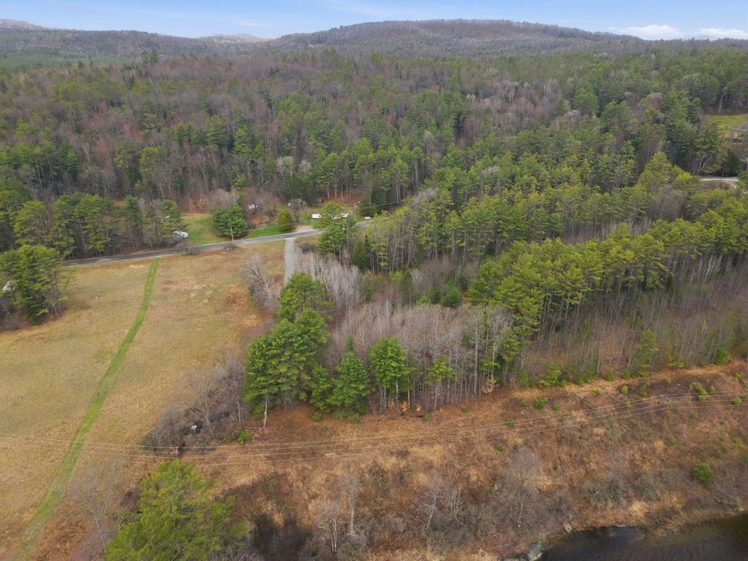 2.55 serene acres with 160 feet of Ammonoosuc River frontage, an - photo 8