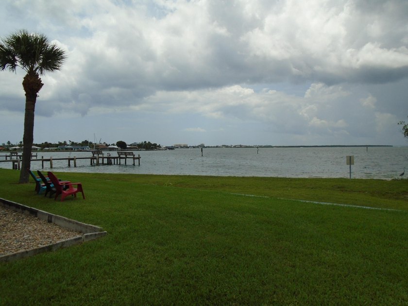 Beautiful waterfront first floor corner unit. Great water view - photo 31