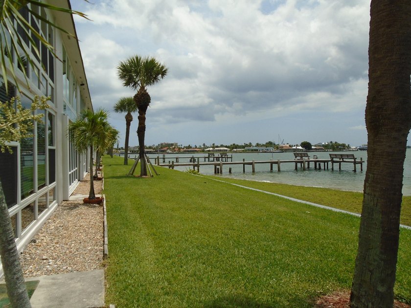 Beautiful waterfront first floor corner unit. Great water view - photo 35