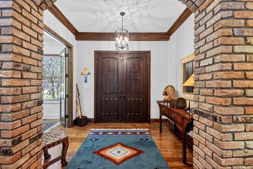 Nestled on nearly two private acres this one-of-a-kind estate - photo 11