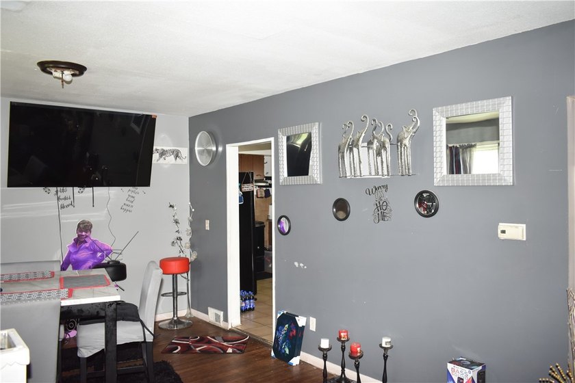 This spacious 4-bedroom home. Large front porch. You also have a - photo 9