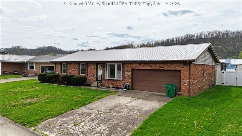 This well-maintained brick ranch-style home offers three - photo 3