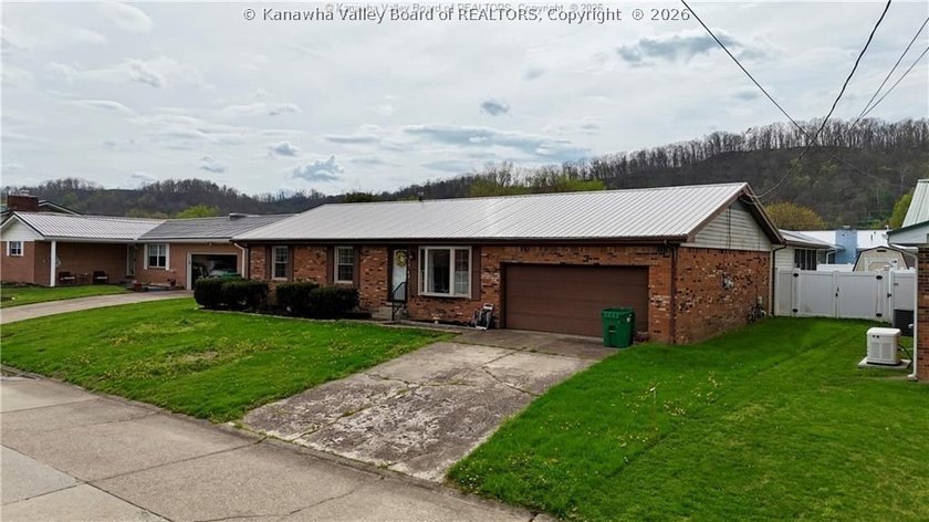 This well-maintained brick ranch-style home offers three - photo 4
