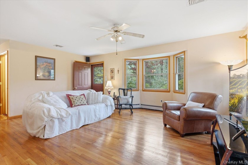 Feel the warmth of this home the moment you walk through the - photo 5
