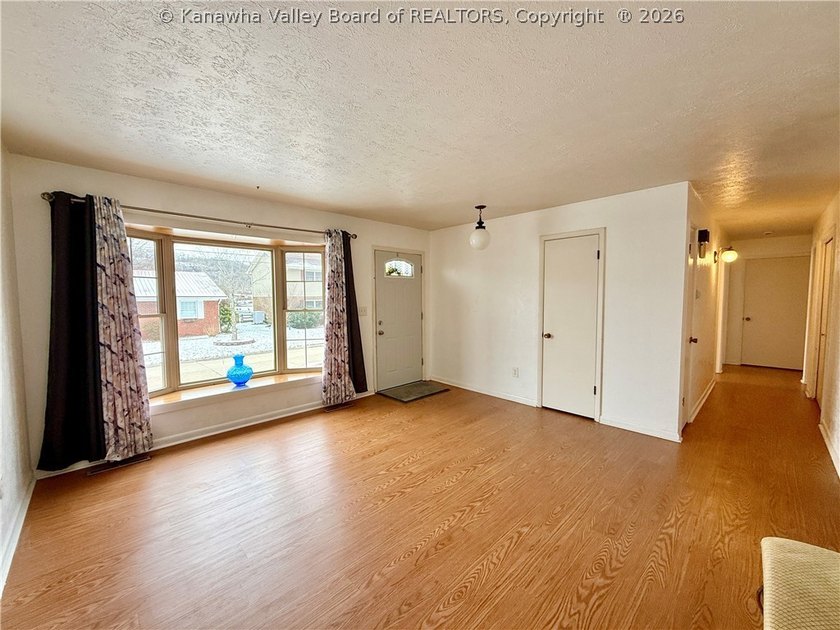 This well-maintained brick ranch-style home offers three - photo 6