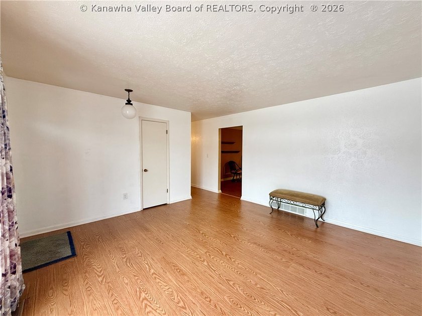 This well-maintained brick ranch-style home offers three - photo 7