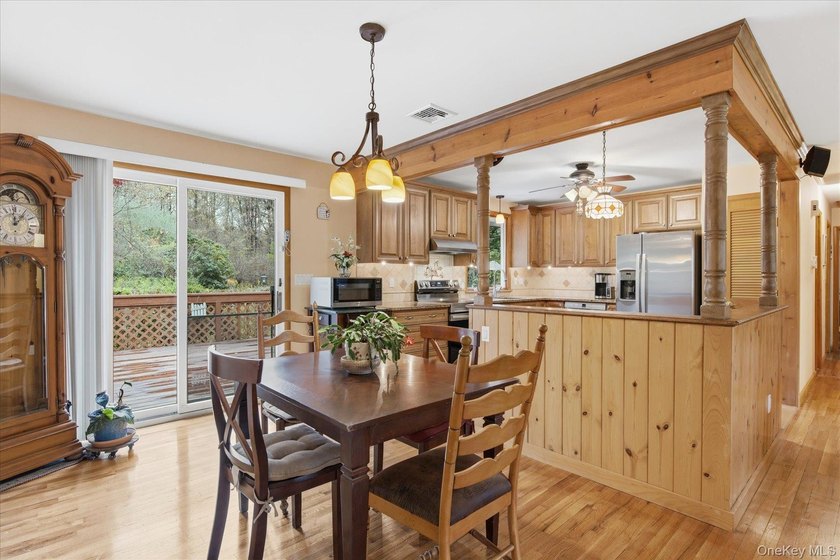 Feel the warmth of this home the moment you walk through the - photo 9