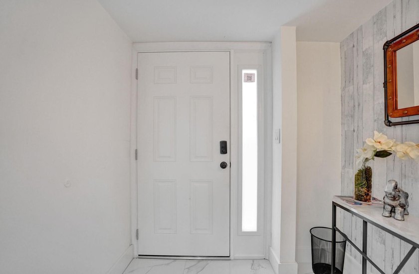 Completely renovated and move-in ready! This stunning unit has - photo 12