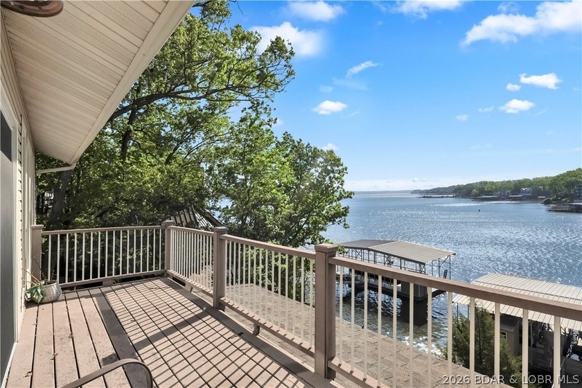 This 3-bedroom, 2-bath home on Nonsuch in Lake Ozark is now - photo 13