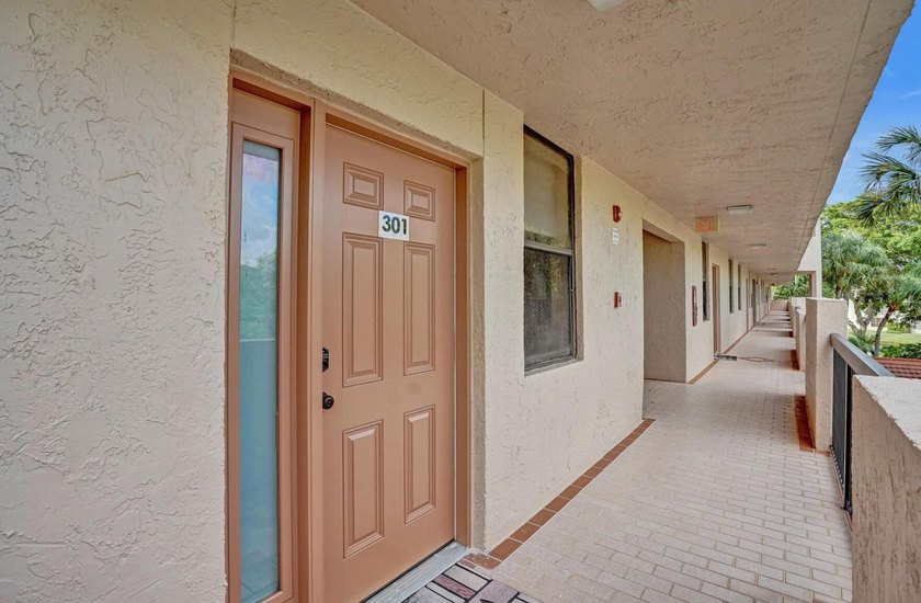 Completely renovated and move-in ready! This stunning unit has - photo 14