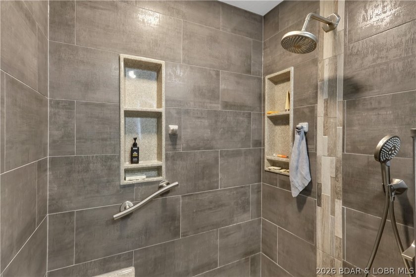 This 3-bedroom, 2-bath home on Nonsuch in Lake Ozark is now - photo 20