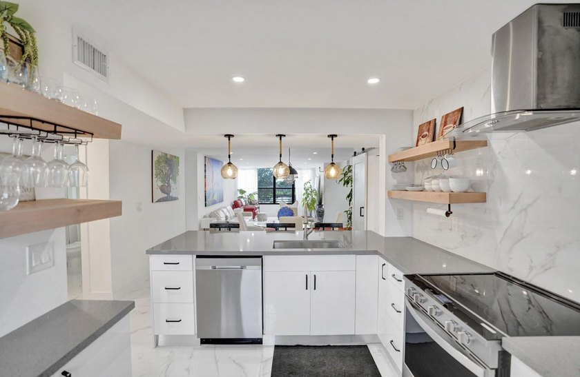 Completely renovated and move-in ready! This stunning unit has - photo 20