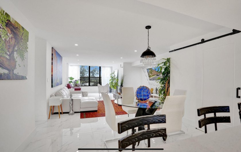 Completely renovated and move-in ready! This stunning unit has - photo 25