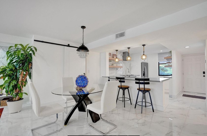 Completely renovated and move-in ready! This stunning unit has - photo 26