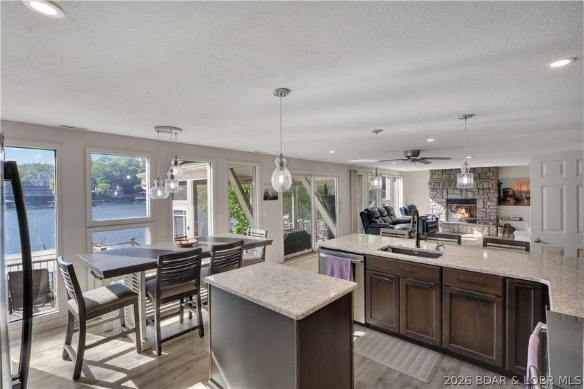 This 3-bedroom, 2-bath home on Nonsuch in Lake Ozark is now - photo 30