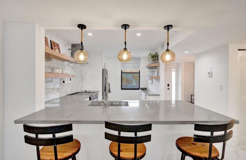 Completely renovated and move-in ready! This stunning unit has - photo 30