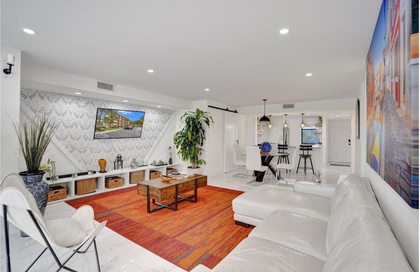 Completely renovated and move-in ready! This stunning unit has - photo 32