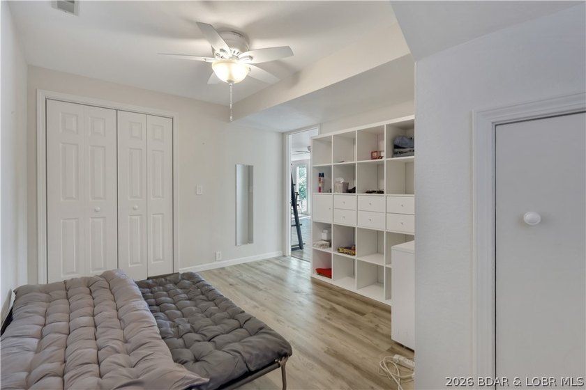 This 3-bedroom, 2-bath home on Nonsuch in Lake Ozark is now - photo 33