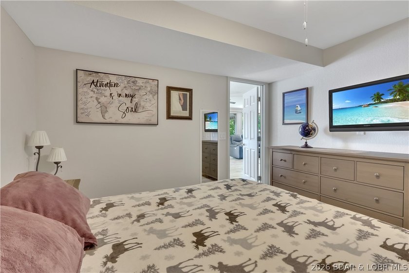 This 3-bedroom, 2-bath home on Nonsuch in Lake Ozark is now - photo 37