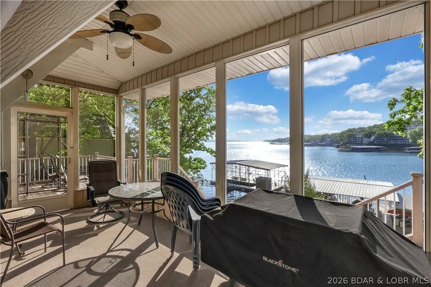 This 3-bedroom, 2-bath home on Nonsuch in Lake Ozark is now - photo 42
