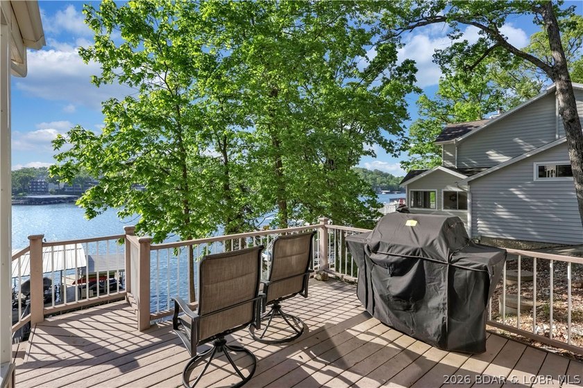 This 3-bedroom, 2-bath home on Nonsuch in Lake Ozark is now - photo 44