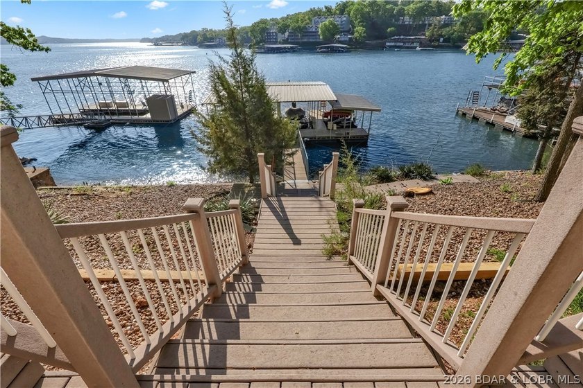This 3-bedroom, 2-bath home on Nonsuch in Lake Ozark is now - photo 50