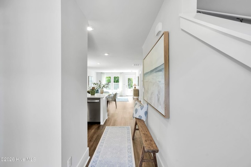 The Norman townhome is a two-story residence with 4 bedrooms and - photo 3