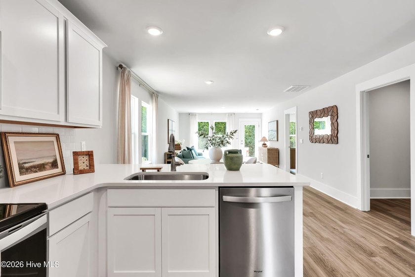 The Norman townhome is a two-story residence with 4 bedrooms and - photo 8