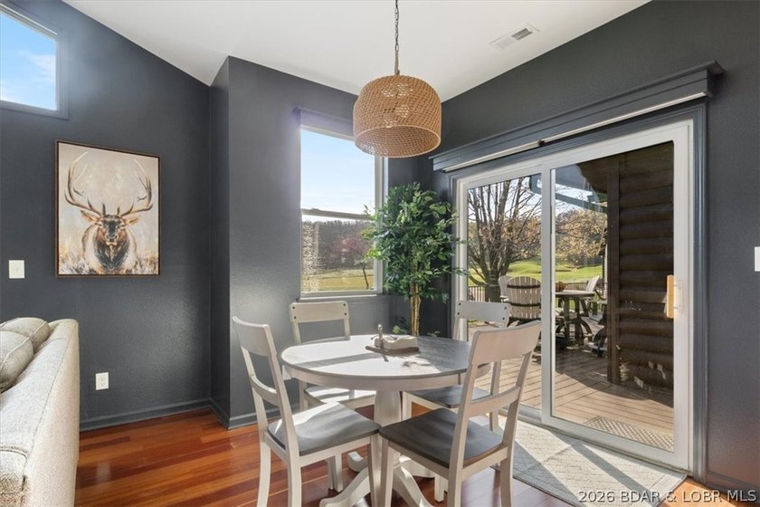 Enjoy this beautifully updated cottage at one of the best golf - photo 5
