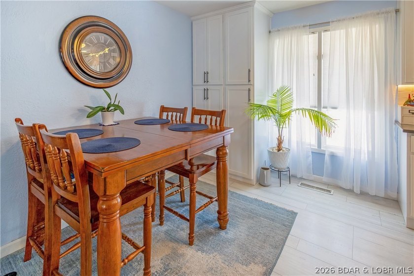 Nestled on over 2 acres with panoramic views of Lake of the - photo 35