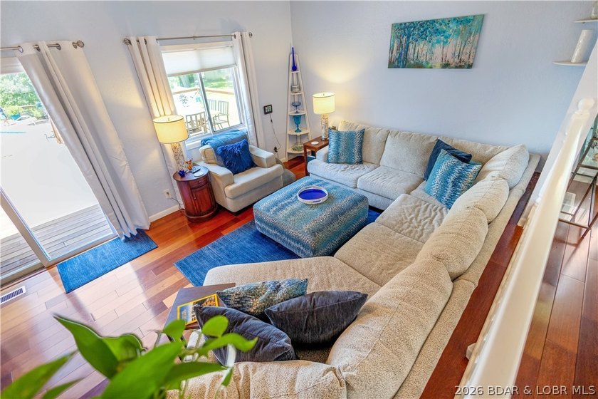 Nestled on over 2 acres with panoramic views of Lake of the - photo 36