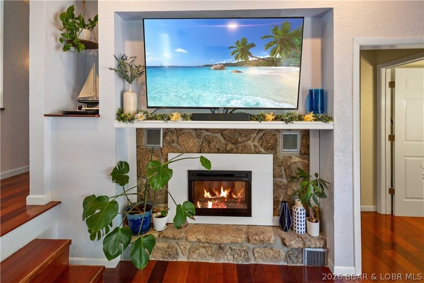 Nestled on over 2 acres with panoramic views of Lake of the - photo 43