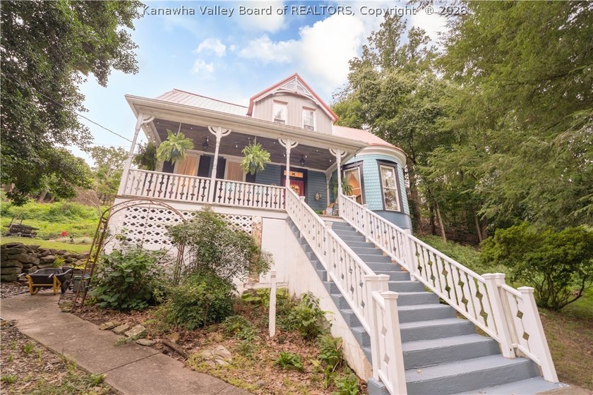 Step into timeless charm with this beautifully updated 1893 - photo 2