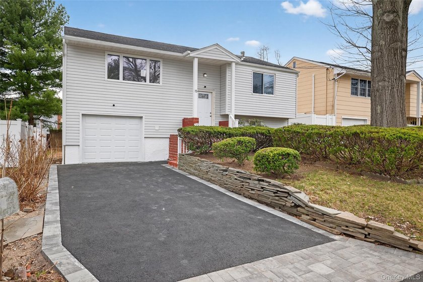 Beautifully renovated 4-bedroom Hi-Ranch offering exceptional - photo 2